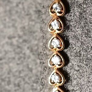 Tennis bracelet hearts with crystal hearts inside strong clasp gold color -mint